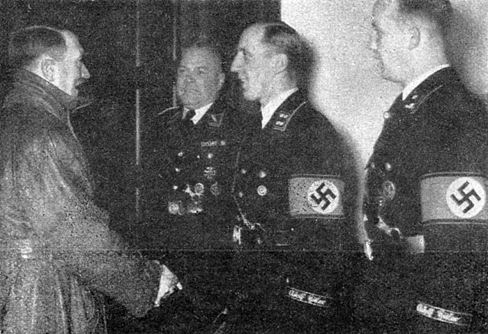 Bruno Gesche gives his well wishes to the Führer for the new year, with Johann Rattenhuber and Hauptscharführer Eichberg